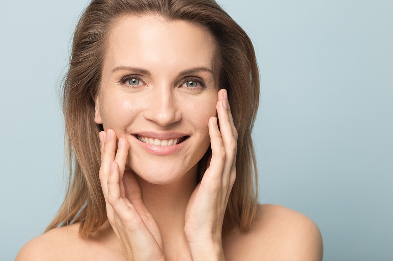 Head shot portrait smiling woman